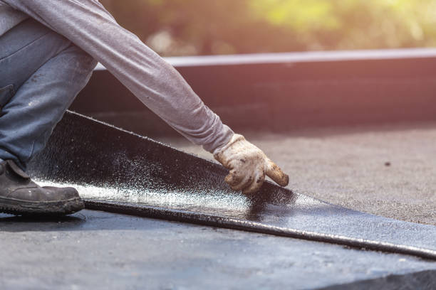 Professional Basement Waterproofing technician working in Bloomfield, IN